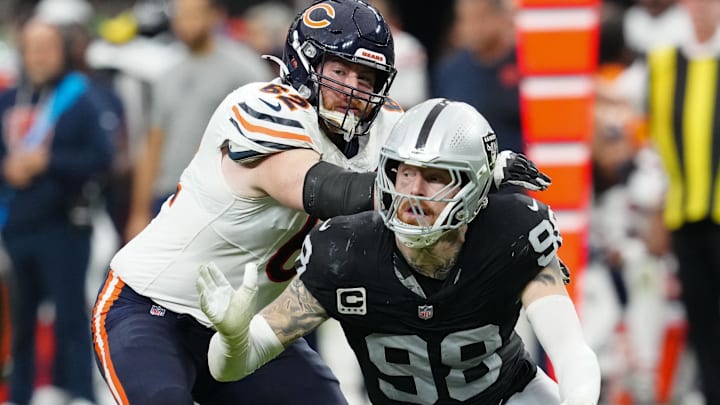Chicago Bears guard Joe Thuney (62) attempts to stop Las Vegas Raiders defensive end Maxx Crosby (98) 