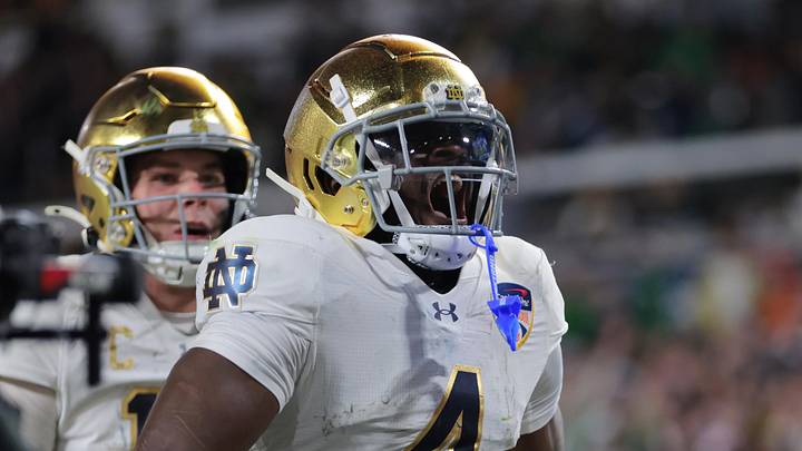 Jan 9, 2025; Miami, FL, USA; Notre Dame Fighting Irish running back Jeremiyah Love (4) celebrates a touch down in the second half against the Penn State Nittany Lions in the Orange Bowl at Hard Rock Stadium. Jan 9, 2025; Miami, FL, USA; Notre Dame Fighting Irish running back Jeremiyah Love (4) celebrates a touch down in the second half against the Penn State Nittany Lions in the Orange Bowl at Hard Rock Stadium.