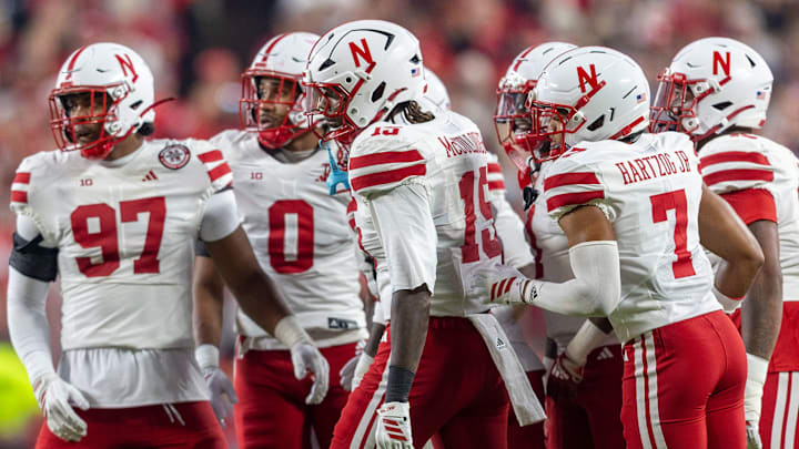 Members of the Nebraska defense prepare to take the field for the opening drive of the game against Cincinnati in Kansas City.