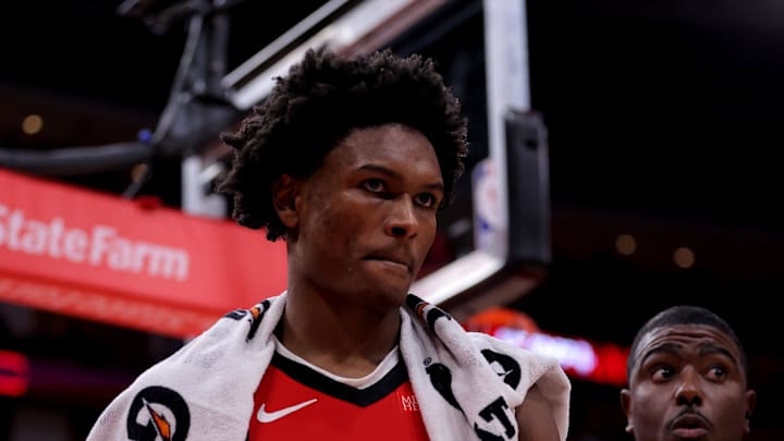 Dec 29, 2024; Houston, Texas, USA; Houston Rockets guard Amen Thompson (1) is escorted off the court after being ejected against the Miami Heat during the fourth quarter at Toyota Center. Mandatory Credit: Erik Williams-Imagn Images
