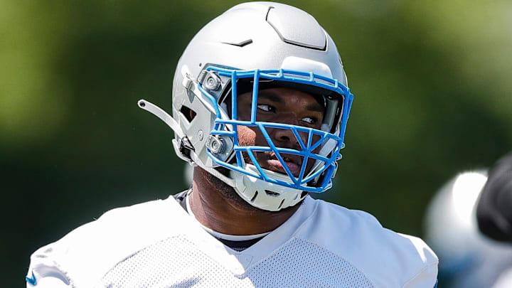 Detroit Lions defensive lineman Mekhi Wingo (94) practices during OTAs at Detroit Lions headquarters and practice facility in Allen Park on Tuesday, June 11, 2024.