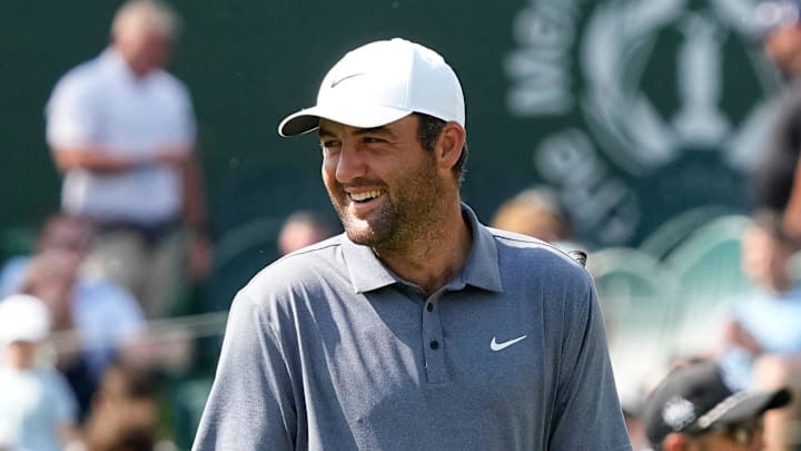 Scottie Scheffler laughs on the 14th green during the first round of the Memorial Tournament at Muirfield Village Golf Club in Dublin on May 29, 2025. Scottie Scheffler laughs on the 14th green during the first round of the Memorial Tournament at Muirfield Village Golf Club in Dublin on May 29, 2025.