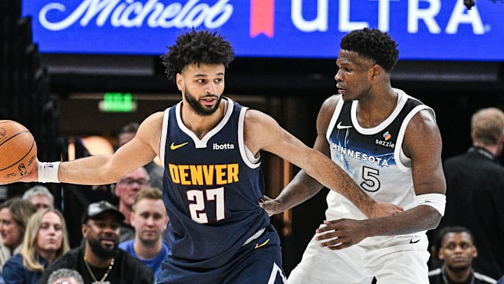 Jan 25, 2025; Minneapolis, Minnesota, USA; Denver Nuggets guard Jamal Murray (27) is defended by Minnesota Timberwolves guard Anthony Edwards (5) during the third quarter at Target Center. Jan 25, 2025; Minneapolis, Minnesota, USA; Denver Nuggets guard Jamal Murray (27) is defended by Minnesota Timberwolves guard Anthony Edwards (5) during the third quarter at Target Center.
