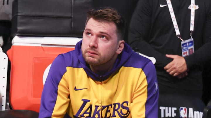 Apr 9, 2025; Dallas, Texas, USA; Los Angeles Lakers guard Luka Doncic (77) reacts while watching a tribute video before the game against the Dallas Mavericks at American Airlines Center. Mandatory Credit: Kevin Jairaj-Imagn Images Apr 9, 2025; Dallas, Texas, USA; Los Angeles Lakers guard Luka Doncic (77) reacts while watching a tribute video before the game against the Dallas Mavericks at American Airlines Center. Mandatory Credit: Kevin Jairaj-Imagn Images
