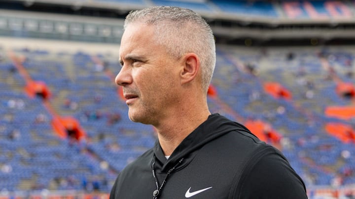 Nov 29, 2025; Gainesville, Florida, USA; Florida State Seminoles head coach Mike Norvell walks the sidelines before a game against the Florida Gators at Ben Hill Griffin Stadium. Mandatory Credit: Bob Kupbens-Imagn Images