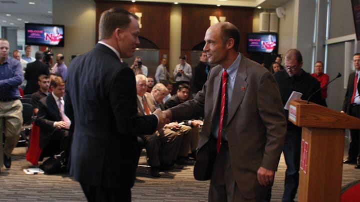 Dec 5, 2014; Lincoln, NE, USA; Nebraska Cornhuskers head coach Mike Riley (right) shakes hands with athletic director Shawn Eichorst at Memorial Stadium. Mandatory Credit: Bruce Thorson-Imagn Images Dec 5, 2014; Lincoln, NE, USA; Nebraska Cornhuskers head coach Mike Riley (right) shakes hands with athletic director Shawn Eichorst at Memorial Stadium. Mandatory Credit: Bruce Thorson-Imagn Images