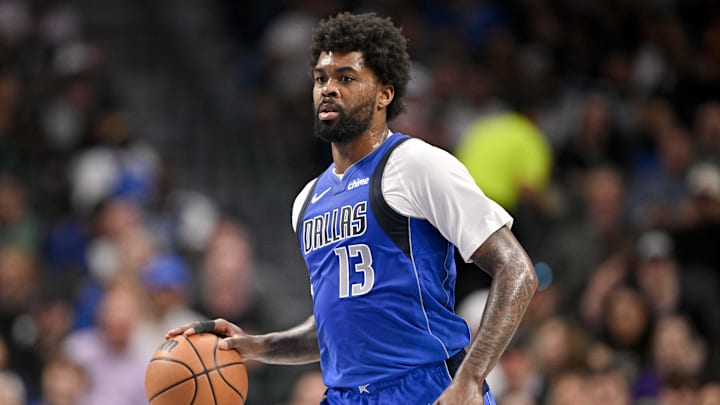 Feb 26, 2026; Dallas, Texas, USA; Dallas Mavericks forward Naji Marshall (13) brings the ball up court against the Sacramento Kings during the second quarter at the American Airlines Center. Mandatory Credit: Jerome Miron-Imagn Images