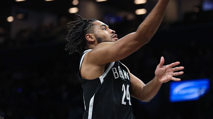 Jan 1, 2026; Brooklyn, New York, USA; Brooklyn Nets guard Cam Thomas (24) shoots the ball against the Houston Rockets during the first half at Barclays Center. Mandatory Credit: Vincent Carchietta-Imagn Images