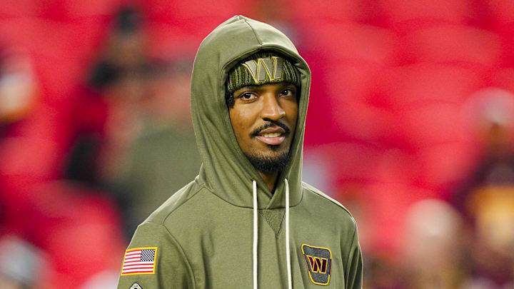 Oct 27, 2025; Kansas City, Missouri, USA; Washington Commanders quarterback Jayden Daniels (5) looks on during warmups prior to a game against the Kansas City Chiefs at GEHA Field at Arrowhead Stadium. Mandatory Credit: Jay Biggerstaff-Imagn Images