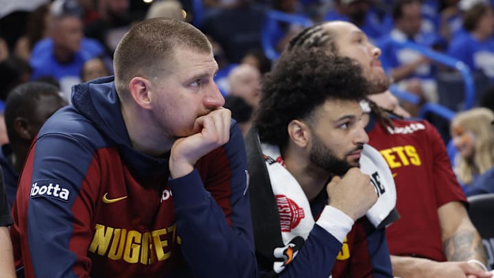 May 18, 2025; Oklahoma City, Oklahoma, USA; Denver Nuggets center Nikola Jokic (15) watches the game from the bench in the fourth quarter against the Oklahoma City Thunder in Game 7 of the second round of the 2025 NBA Playoffs at Paycom Center.