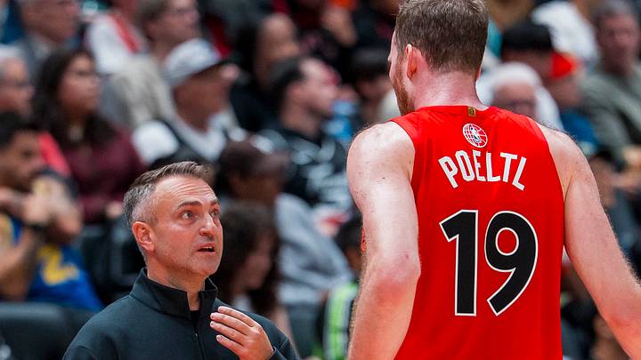 Toronto Raptors head coach Darko Rajakovic talks with center Jakob Poeltl during a stop in play against the Los Angeles Clippers. Toronto Raptors head coach Darko Rajakovic talks with center Jakob Poeltl during a stop in play against the Los Angeles Clippers.