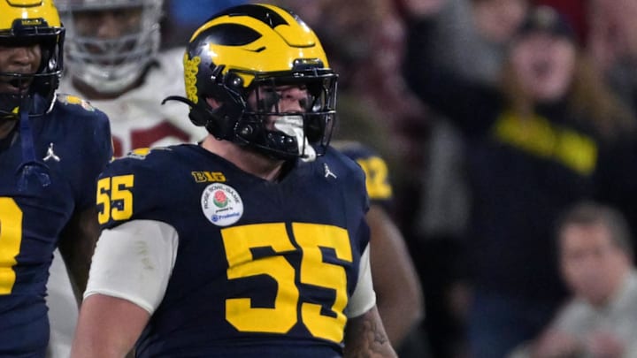 Jan 1, 2024; Pasadena, CA, USA; Michigan Wolverines defensive lineman Mason Graham (55) celebrates after a tackle against the Alabama Crimson Tide during overtime in the 2024 Rose Bowl college football playoff semifinal game at Rose Bowl. Mandatory Credit: Jayne Kamin-Oncea-Imagn Images