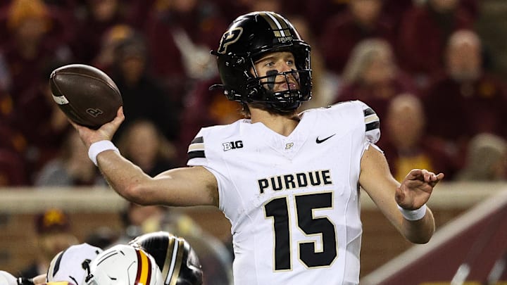 Purdue Boilermakers quarterback Ryan Browne (15) throws the ball