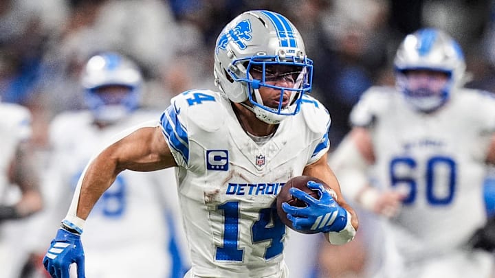 Detroit Lions wide receiver Amon-Ra St. Brown (14).