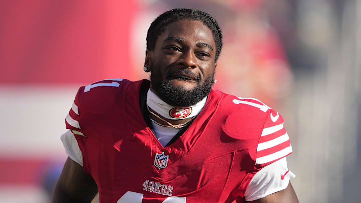 Sep 9, 2024; Santa Clara, California, USA; San Francisco 49ers wide receiver Brandon Aiyuk (11) is introduced to the crowd before the game against the New York Jets at Levi's Stadium. Mandatory Credit: Darren Yamashita-Imagn Images