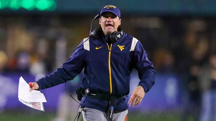Nov 23, 2024; Morgantown, West Virginia, USA; West Virginia Mountaineers head coach Neal Brown argues a call during the fourth quarter against the UCF Knights at Mountaineer Field at Milan Puskar Stadium. Mandatory Credit: Ben Queen-Imagn Images