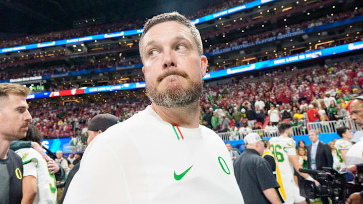 Oregon head coach Dan Lanning walks off the field after the Ducks’ loss as the Oregon Ducks face the Indiana Hoosiers in the Peach Bowl on Jan. 9, 2026, at Mercedes-Benz Stadium in Atlanta, Georgia. Oregon head coach Dan Lanning walks off the field after the Ducks’ loss as the Oregon Ducks face the Indiana Hoosiers in the Peach Bowl on Jan. 9, 2026, at Mercedes-Benz Stadium in Atlanta, Georgia.