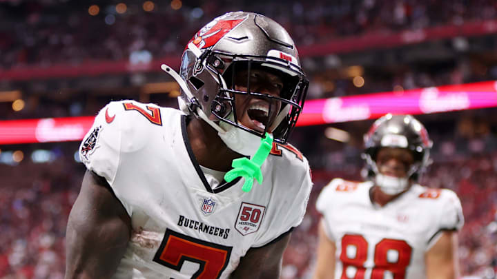 Sep 7, 2025; Atlanta, Georgia, USA; Tampa Bay Buccaneers running back Bucky Irving (7) celebrates after scoring a touchdown against the Atlanta Falcons during the third quarter at Mercedes-Benz Stadium. Mandatory Credit: Brett Davis-Imagn Images