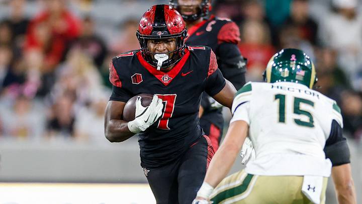 Oct 3, 2025; San Diego, California, USA; San Diego State Aztecs running back Lucky Sutton (7). Oct 3, 2025; San Diego, California, USA; San Diego State Aztecs running back Lucky Sutton (7).