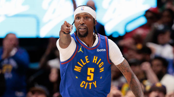 Apr 20, 2024; Denver, Colorado, USA; Denver Nuggets guard Kentavious Caldwell-Pope (5) reacts to a three point shot during the third quarter against the Los Angeles Lakers in game one of the first round for the 2024 NBA playoffs at Ball Arena. Mandatory Credit: Andrew Wevers-USA TODAY Sports