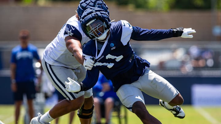 Aug 1, 2023; Oxnard, CA, USA; Dallas Cowboys linebacker Micah Parsons (11) rushes against offensive