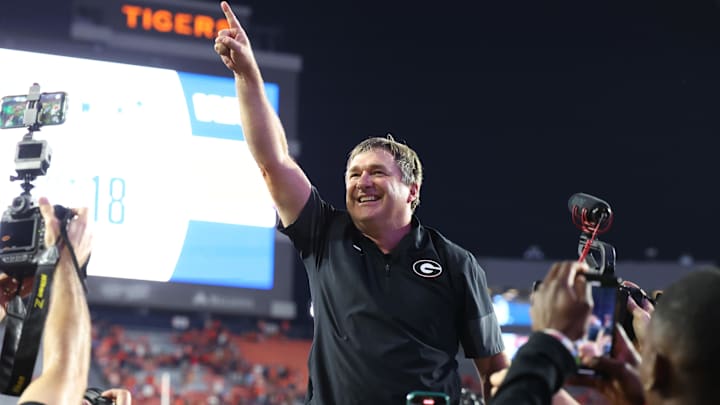 Oct 11, 2025; Auburn, Alabama, USA;  Georgia Bulldogs head coach Kirby Smart celebrates after the Bulldogs beat the Auburn Tigers at Jordan-Hare Stadium. Mandatory Credit: John Reed-Imagn Images