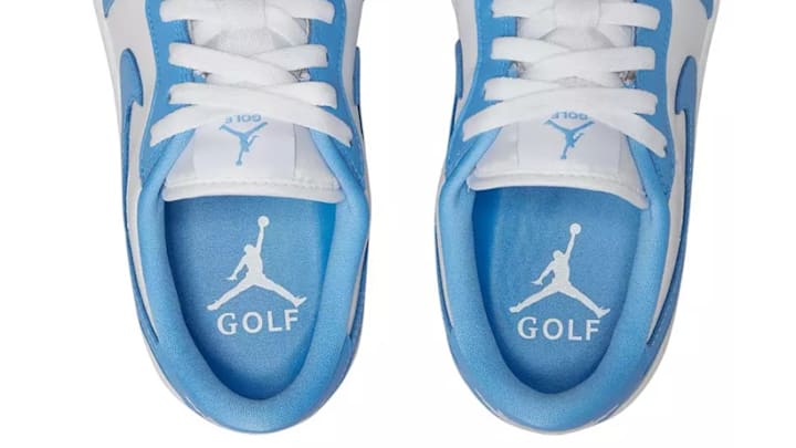 The Air Jordan 1 Low Golf Shoe in the "University Blue" colorway. The Air Jordan 1 Low Golf Shoe in the "University Blue" colorway.