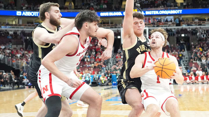 Purdue Boilermakers guard Omer Mayer defends Nebraska Cornhuskers guard Sam Hoiberg.