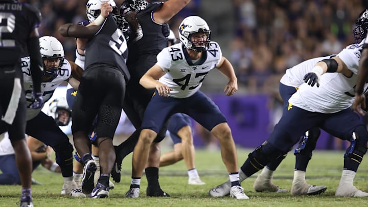 Sep 30, 2023; Fort Worth, Texas, USA; West Virginia Mountaineers long snapper Austin Brinkman (43) blocks on a field goal in the fourth quarter against the TCU Horned Frogs at Amon G. Carter Stadium. Mandatory Credit: Tim Heitman-Imagn Images