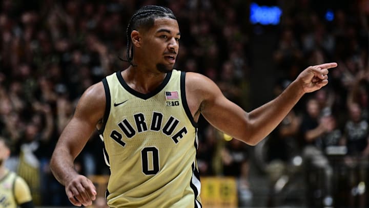 Purdue Boilermakers guard C.J. Cox (0) celebrates a basket Purdue Boilermakers guard C.J. Cox (0) celebrates a basket