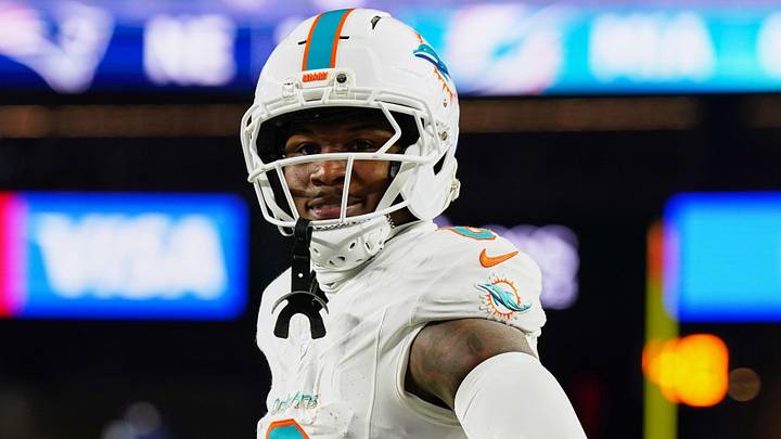 Jan 4, 2026; Foxborough, Massachusetts, USA; Miami Dolphins wide receiver Malik Washington (6) reacts after catching a two-yard pass for a touchdown thrown by quarterback Quinn Ewers (not pictured) against the New England Patriots during the second quarter at Gillette Stadium. Mandatory Credit: David Butler II-Imagn Images