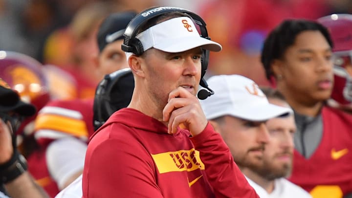 Nov 16, 2024; Los Angeles, California, USA; Southern California Trojans head coach Lincoln Riley watches game action against the Nebraska Cornhuskers during the second half at the Los Angeles Memorial Coliseum. Mandatory Credit: Gary A. Vasquez-Imagn Images