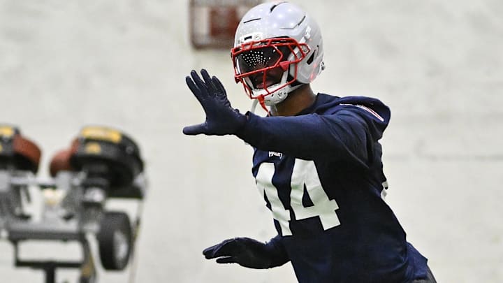 New England Patriots linebacker K'Lavon Chaisson (44) runs through a drill during minicamp held in the WIN Field House at Gillette Stadium.