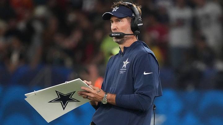 Dallas Cowboys head coach Brian Schottenheimer looks on during the game against the Baltimore Ravens at Maracana Stadium. Dallas Cowboys head coach Brian Schottenheimer looks on during the game against the Baltimore Ravens at Maracana Stadium.