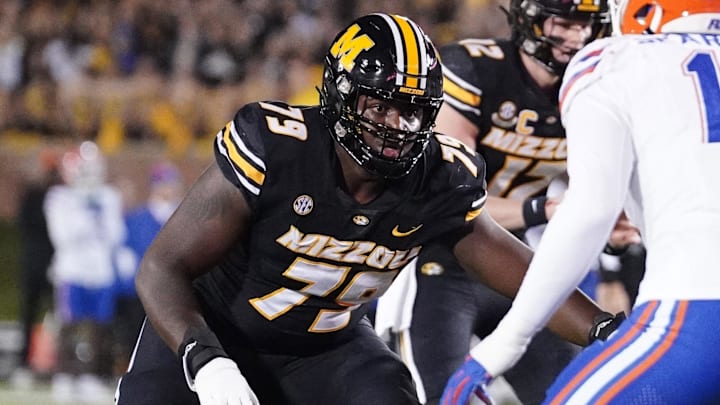 Nov 18, 2023; Columbia, Missouri, USA; Missouri Tigers offensive lineman Armand Membou (79) at the line of scrimmage against the Florida Gators during the game at Faurot Field at Memorial Stadium. Mandatory Credit: Denny Medley-Imagn Images