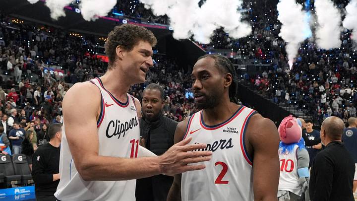 Feb 19, 2026; Inglewood, California, USA; LA Clippers center Brook Lopez (11) and forward Kawhi Leonard (2) react after the game against the Denver Nuggets at Intuit Dome. Mandatory Credit: Kirby Lee-Imagn Images