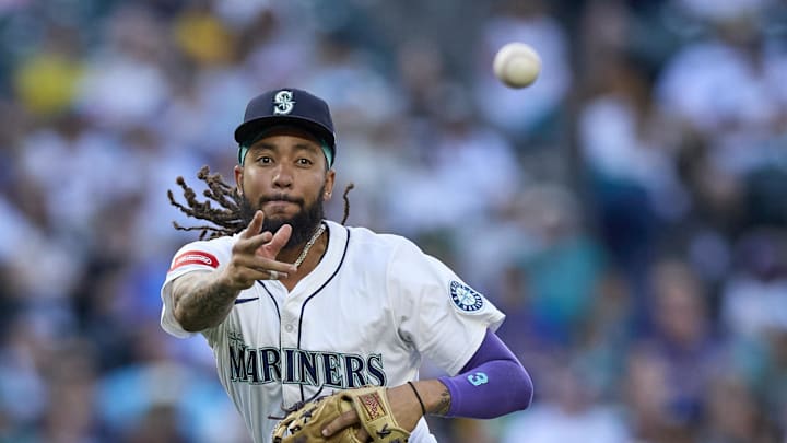 Seattle Mariners shortstop J.P. Crawford (3) throws out Pittsburgh Pirates third baseman Ke'Bryan Hayes (13) at first during the third inning at T-Mobile Park on July 5. 
