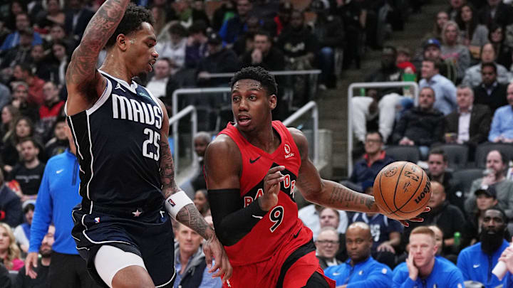 Feb 28, 2024; Toronto, Ontario, CAN; Toronto Raptors guard RJ Barrett (9) controls the ball as Dallas Mavericks forward P.J. Washington (25) tries to defend during the third quarter at Scotiabank Arena. Mandatory Credit: Nick Turchiaro-Imagn Images Feb 28, 2024; Toronto, Ontario, CAN; Toronto Raptors guard RJ Barrett (9) controls the ball as Dallas Mavericks forward P.J. Washington (25) tries to defend during the third quarter at Scotiabank Arena. Mandatory Credit: Nick Turchiaro-Imagn Images