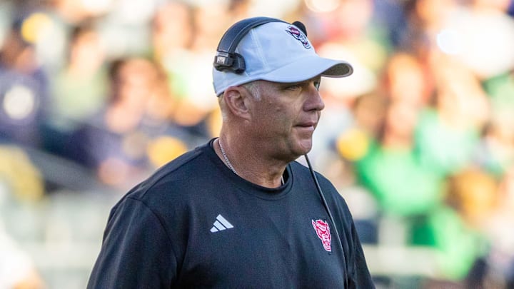 Oct 11, 2025; South Bend, Indiana, USA; NC State Wolfpack head coach Dave Doeren walks on the field against the Notre Dame Fighting Irish during the second half at Notre Dame Stadium. Mandatory Credit: Michael Caterina-Imagn Images Oct 11, 2025; South Bend, Indiana, USA; NC State Wolfpack head coach Dave Doeren walks on the field against the Notre Dame Fighting Irish during the second half at Notre Dame Stadium. Mandatory Credit: Michael Caterina-Imagn Images