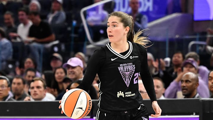 Golden State Valkyries guard Kate Martin (20) dribbles against the Phoenix Mercury in the third quarter at Chase Center. 