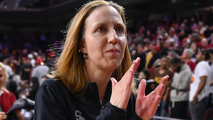 Mar 24, 2025; Los Angeles, California, USA; USC Trojans head coach Lindsay Gottlieb claps her hands as she walks off the court after the Trojans defeated the Mississippi State Bulldogs in an NCAA Tournament second round game at Galen Center. Mandatory Credit: Robert Hanashiro-Imagn Images