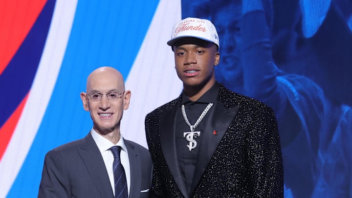 Jun 25, 2025; Brooklyn, NY, USA; Thomas Sorber stands with NBA commissioner Adam Silver after being selected as the 15th pick by the Oklahoma City Thunder in the first round of the 2025 NBA Draft at Barclays Center. Mandatory Credit: Brad Penner-Imagn Images Jun 25, 2025; Brooklyn, NY, USA; Thomas Sorber stands with NBA commissioner Adam Silver after being selected as the 15th pick by the Oklahoma City Thunder in the first round of the 2025 NBA Draft at Barclays Center. Mandatory Credit: Brad Penner-Imagn Images