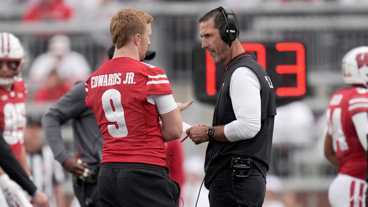 Wisconsin head coach Luke Fickell talks with injured quarterback Billy Edwards Jr. (9) during the fourth quarter of the game Saturday, September 6, 2025 at Camp Randall Stadium in Madison, Wisconsin. Wisconsin beat Middle Tennessee 42-10.