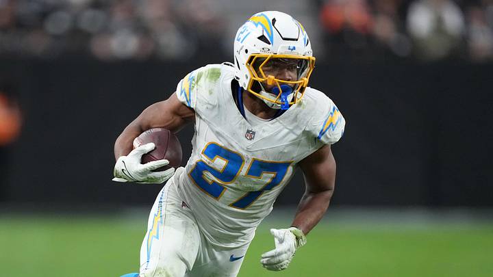 Jan 5, 2025; Paradise, Nevada, USA; Los Angeles Chargers running back J.K. Dobbins (27) carries the ball against the Las Vegas Raiders in the second half at Allegiant Stadium. Mandatory Credit: Kirby Lee-Imagn Images Jan 5, 2025; Paradise, Nevada, USA; Los Angeles Chargers running back J.K. Dobbins (27) carries the ball against the Las Vegas Raiders in the second half at Allegiant Stadium. Mandatory Credit: Kirby Lee-Imagn Images