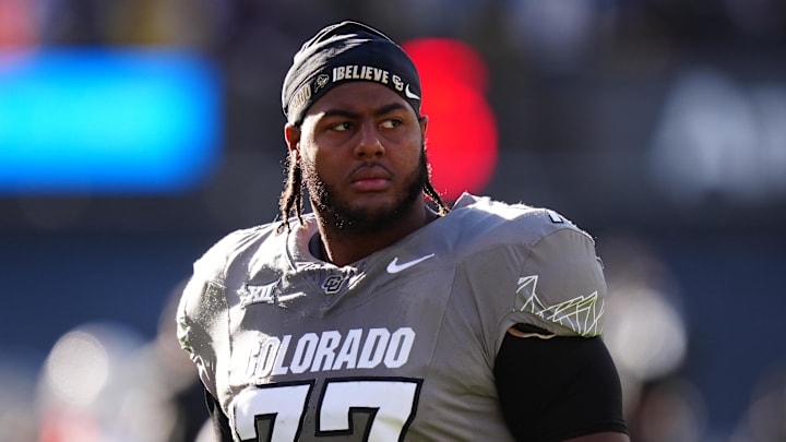 Nov 16, 2024; Boulder, Colorado, USA; Colorado Buffaloes offensive tackle Jordan Seaton (77) looks on before the game against the Utah Utes at Folsom Field. Mandatory Credit: Ron Chenoy-Imagn Images