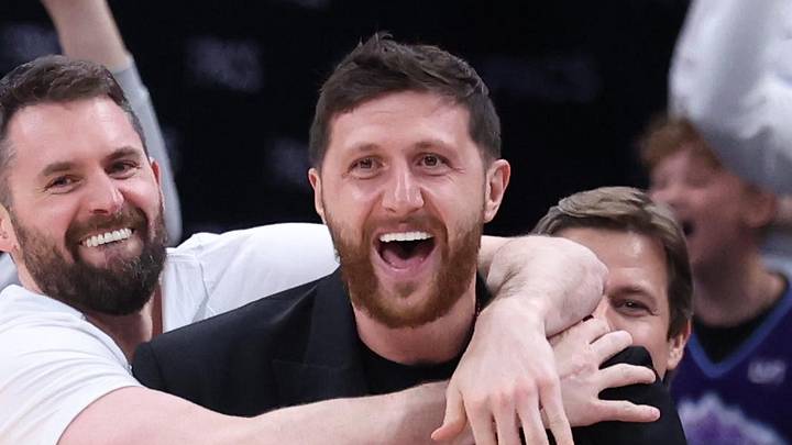Apr 10, 2026; Salt Lake City, Utah, USA; Utah Jazz forward Lauri Markkanen, forward Kevin Love (middle) and center Jusuf Nurkic react after guard John Konchar completes a triple double against the Memphis Grizzlies during the second half at Delta Center. Mandatory Credit: Rob Gray-Imagn Images