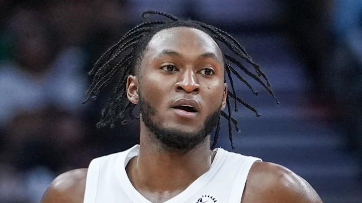 Toronto Raptors guard Immanuel Quickley moves the ball against the Brooklyn Nets.