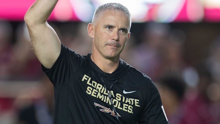Florida State Seminoles head coach Mike Norvell walks down the field. The Miami Hurricanes lead the Florida State Seminoles 14-3 at the half on Saturday, Oct. 4, 2025.