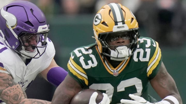 Green Bay Packers running back Emanuel Wilson (23) runs the ball during their game against the Minnesota Vikings. Green Bay Packers running back Emanuel Wilson (23) runs the ball during their game against the Minnesota Vikings.