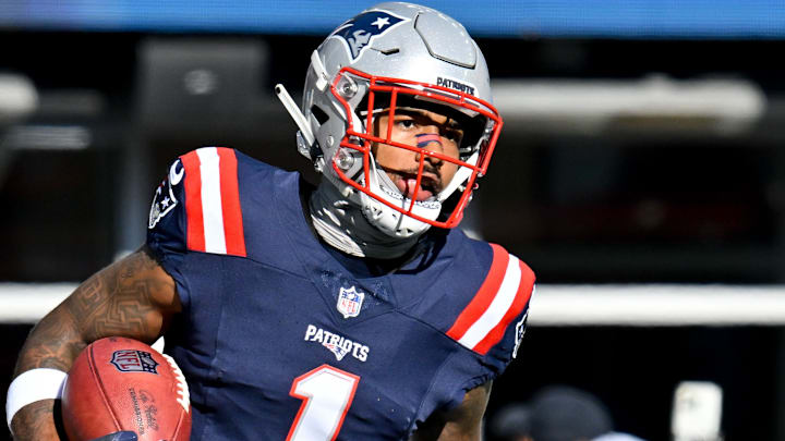 Nov 17, 2024; Foxborough, Massachusetts, USA; New England Patriots wide receiver Ja'Lynn Polk (1) warms up before a game against the Los Angeles Rams at Gillette Stadium. Mandatory Credit: Eric Canha-Imagn Images